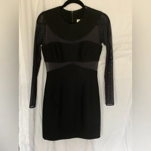andrea polizzi for rex lester black dress 1990's Andrea Polizzi for Rex Lester Could 1990s glam be any more Rachel Green? This Andrea Polizzi for Rex Lester dress is straight out of her closet think post-Bloomingdale's promotion,